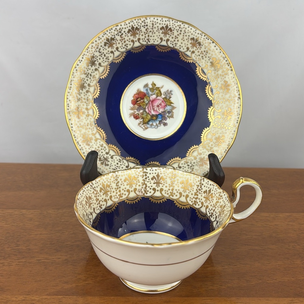 Vintage Aynsley J.A. Bailey signed bone china cobalt blue tea cup and saucer